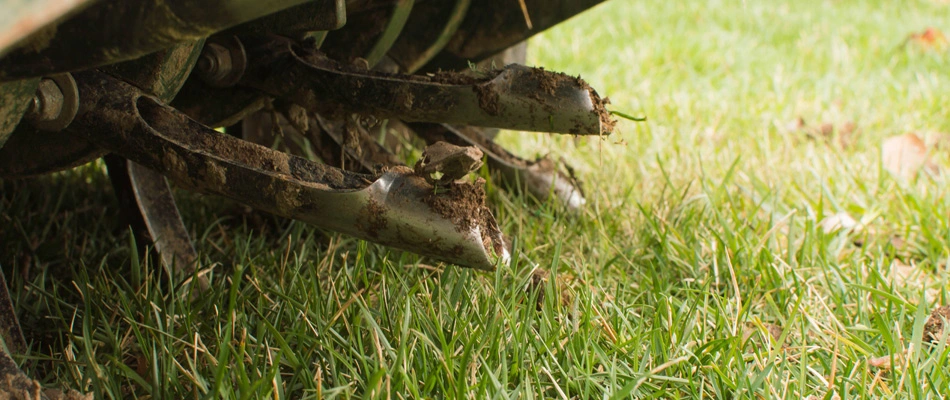 Aerator machine in a lawn servicing lawn in New Hope, PA.